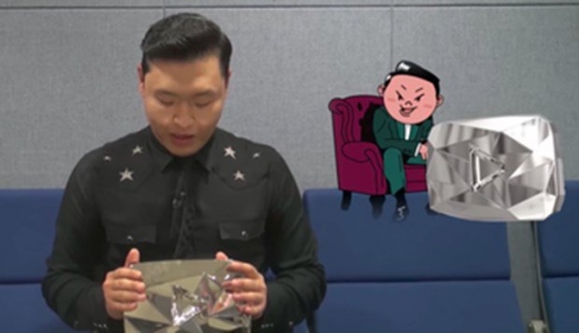 'Gangnam Style' ile ünlenen Psy'ya 'Elmas tuş'  .